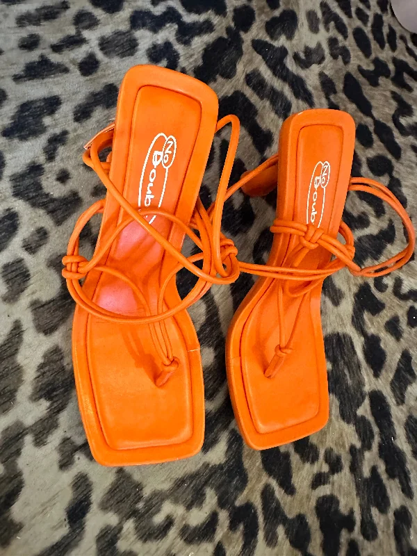 Orange strappy heels